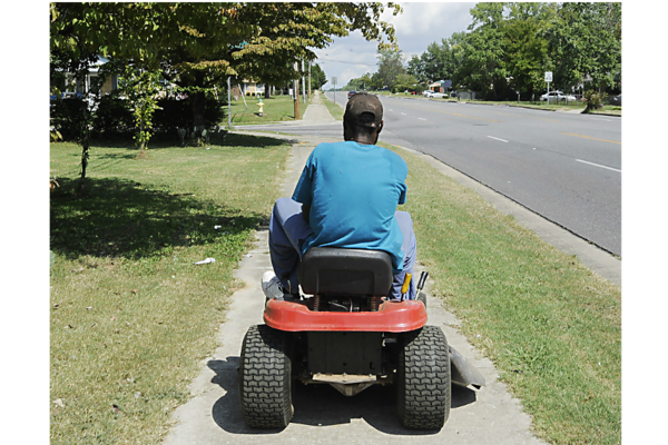 lawnmowing volunteering Photo by Jay Reeves