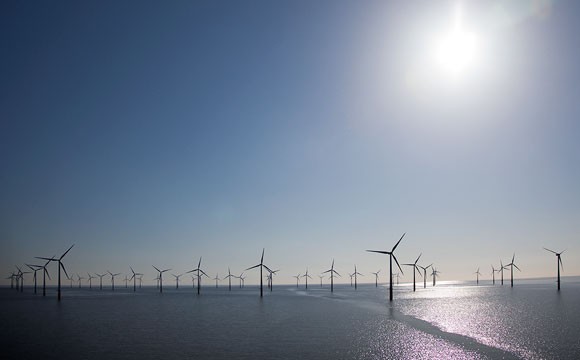 windmills against a blue skyh